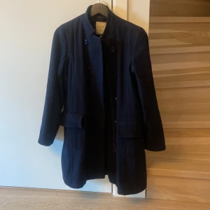 Boomerang kappa  - Gott skick inte använd på något år, nypris ca 3500:- 