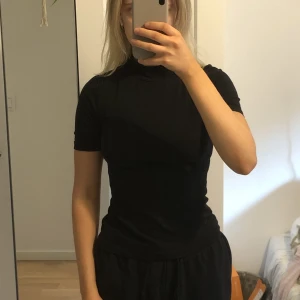 Svart t-shirt  - Aldrig använd 