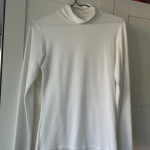 Polotröja  - Från UNIQLO 