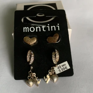 Örhängen  - Örhängen i brons med olika motiv. Använda men i fint skick! 1 par för 10kr och alla 3 för 25!