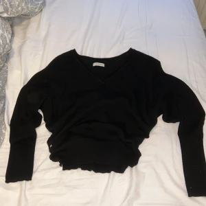 Svart stickad tröja - Svart stickad tröja i storlek M