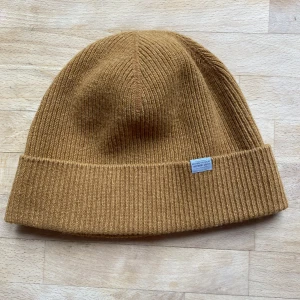 Houdini mössa  - Houdini mössa i lammull storlek M 