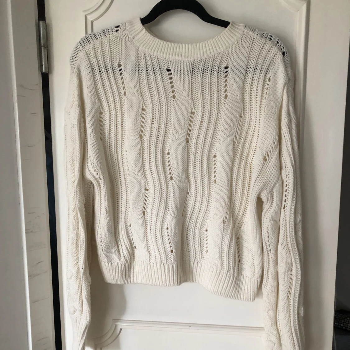 vit stickad tröja