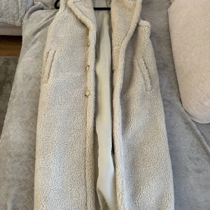 Kappa från polo  - Mysig kappa från polo ralph lauren utan ärmar. Storlek XXS men passar upp till M 