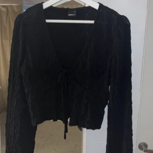 Svart blus  - Från Gina storlek m. Aldrig använda 