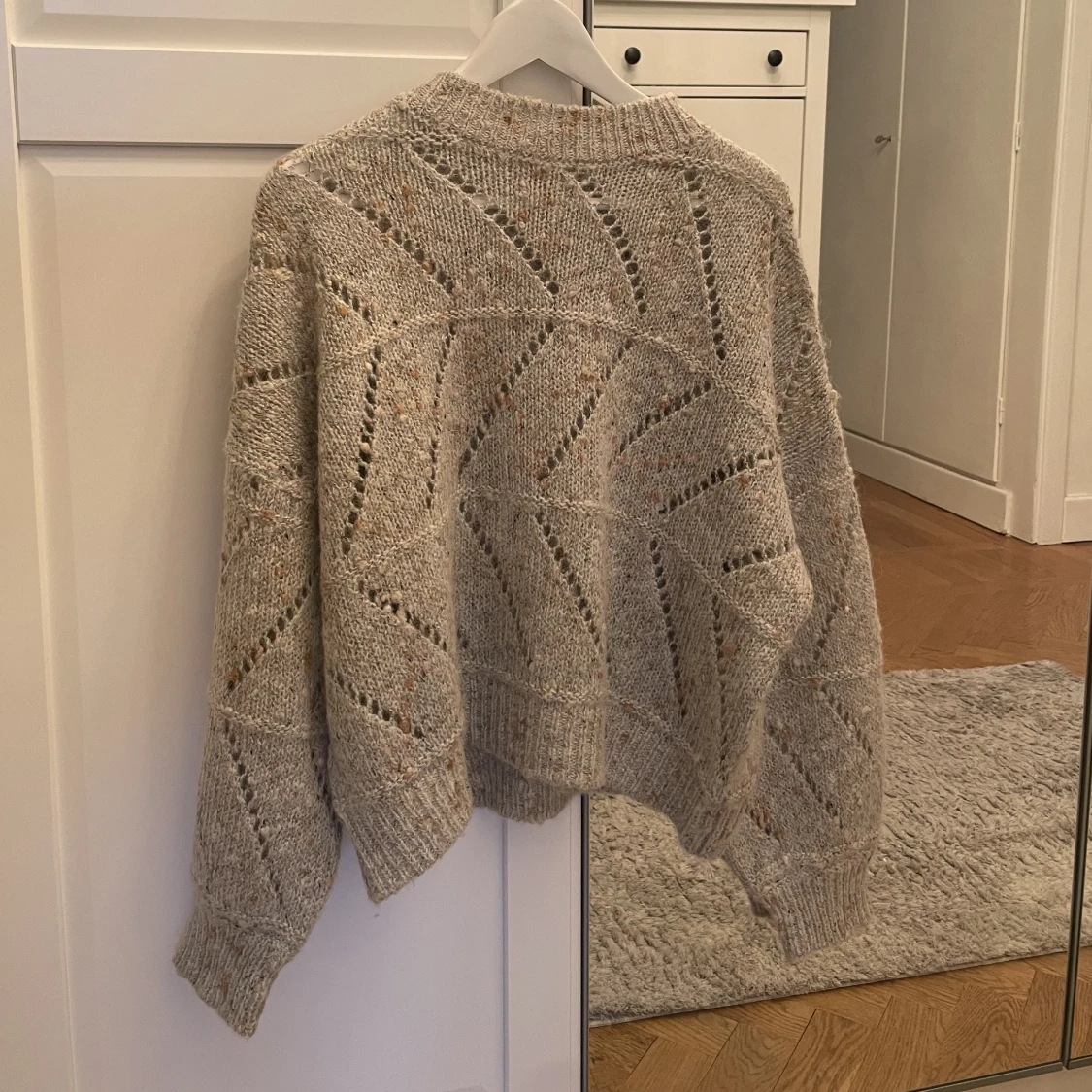 Grå stickad  - 91
