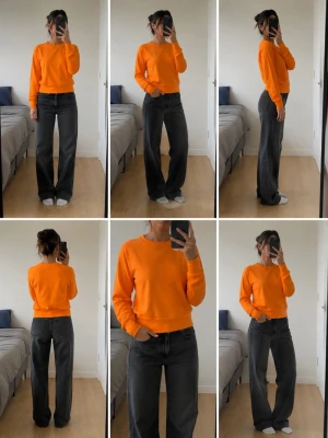 Orange sweatshirt från Fruit of the Loom - En enkel och snygg orange sweatshirt från Fruit of the Loom. Tröjan har rund halsringning, långa ärmar och en rak passform. Tillverkad i mjukt bomullsmaterial som känns skönt mot huden. Perfekt att matcha med jeans eller byxor för en avslappnad look. Ny utan prislapp