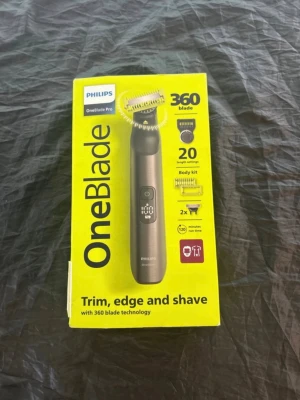 Philips Oneblade 360 pro - Använd endast för klippning på hår. Fungerar fint laddare medföljer ej.