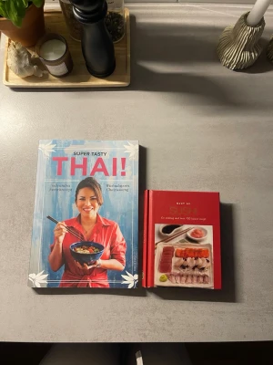 Kokböcker  - En thai och en sushi bok 