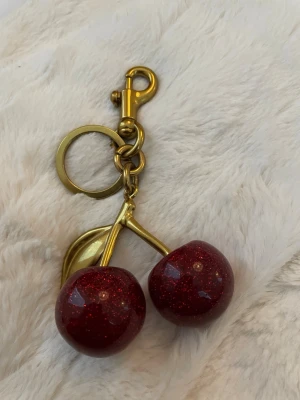 Cherry keychain/charm 🍒 - Unused cherry charm/keychain fits well in a bag as a decoration 🍒