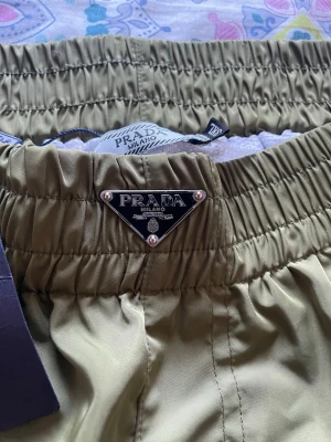 Prada Simshorts  - Använda ett par gången, finns tecken på användning ‼️ men är i bra skick samt kommer med tag✅kan fraktas samma dag🫡