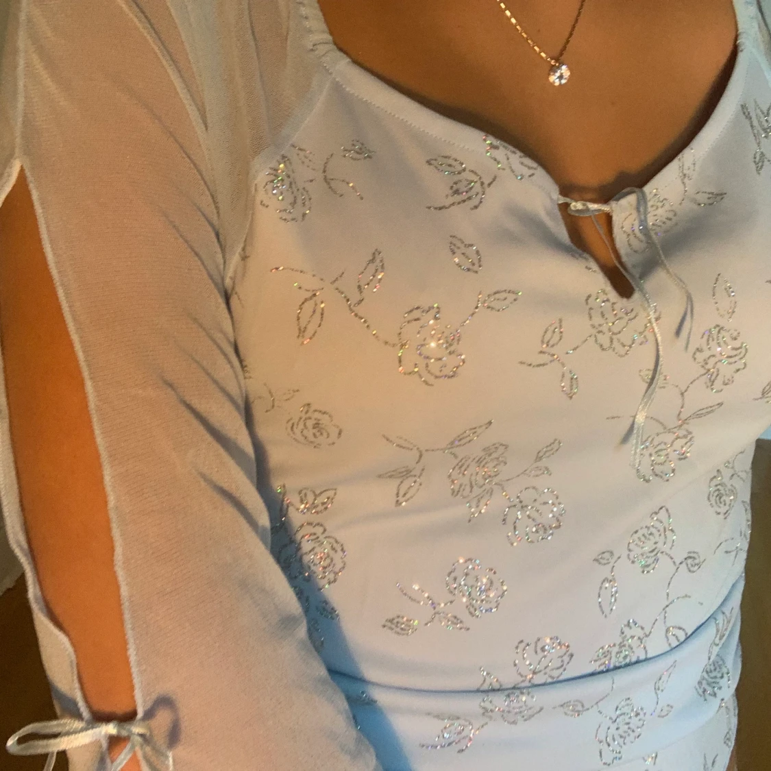 Ljusblå glittrig topp - 90