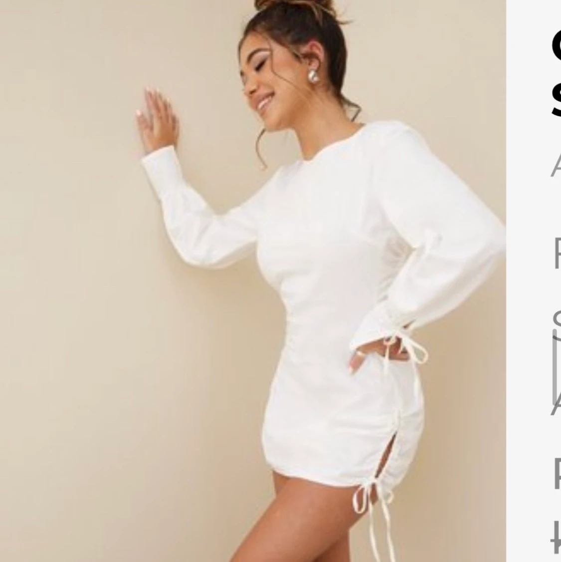 Vit långärmad klänning