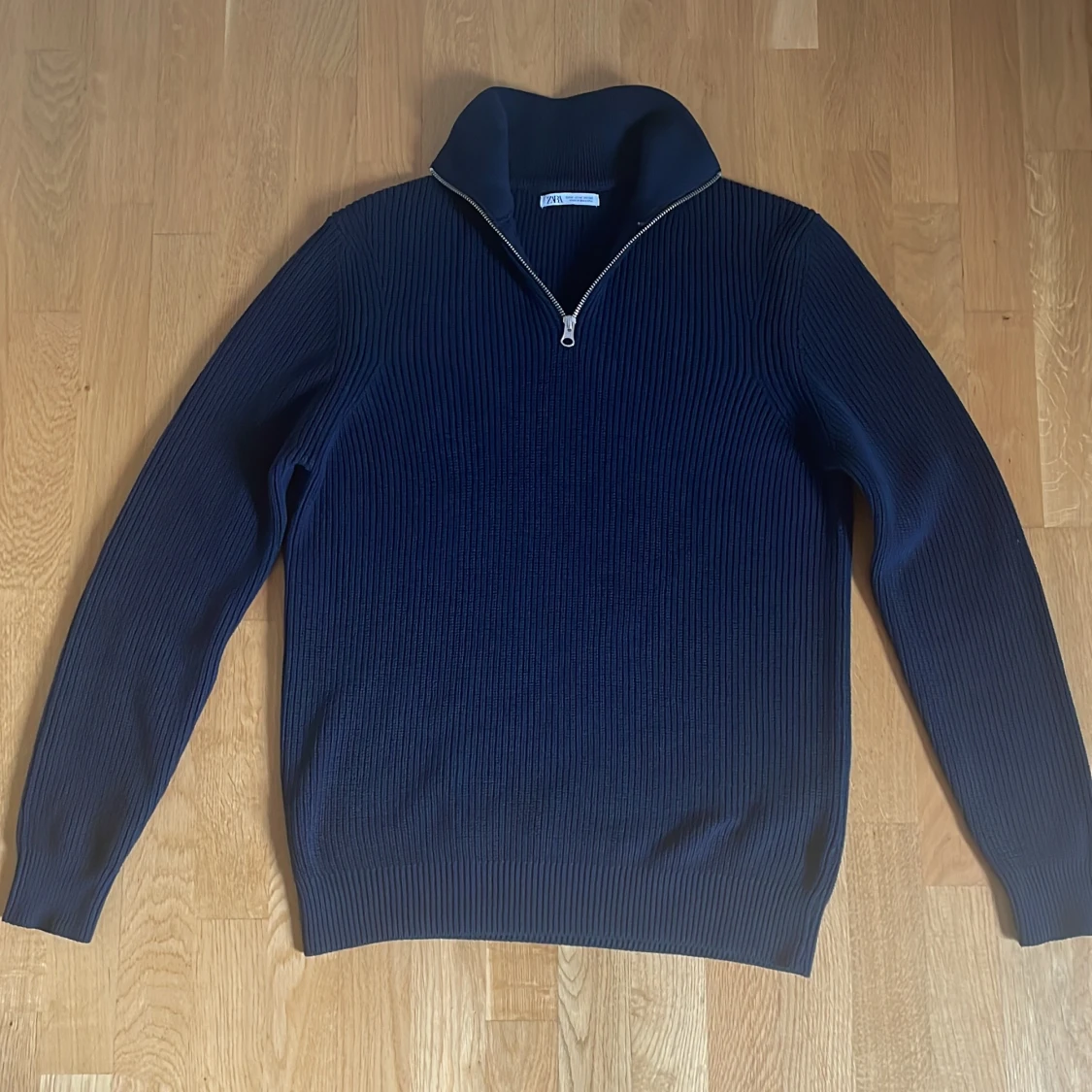 Marinblå stickad tröja  - 90