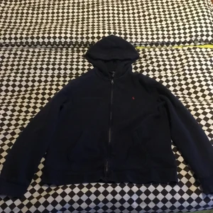 Polo Ralph Lauren - Mörk blå polo flis, storlek xs 