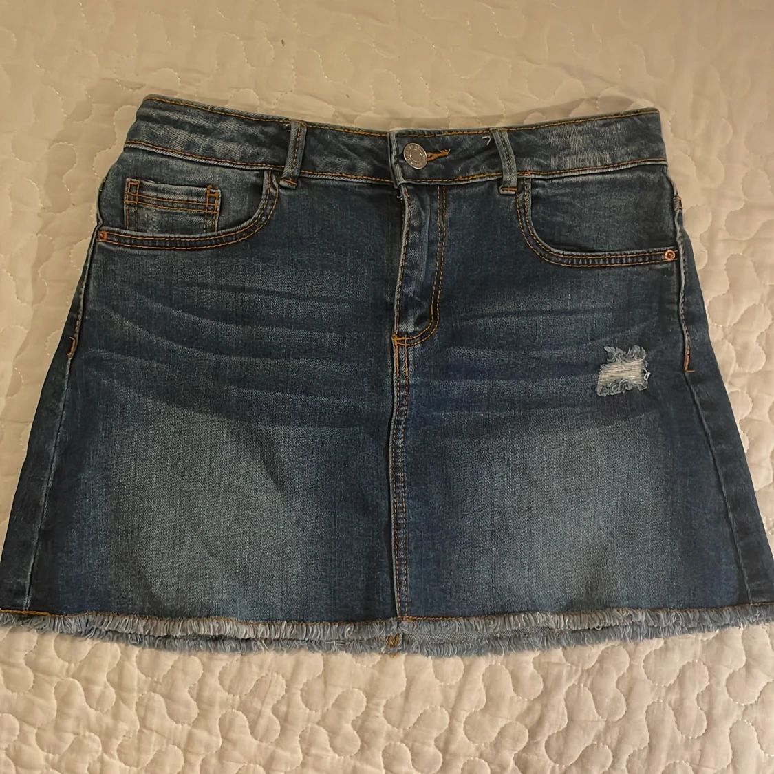 En mini jeanskjol - 91