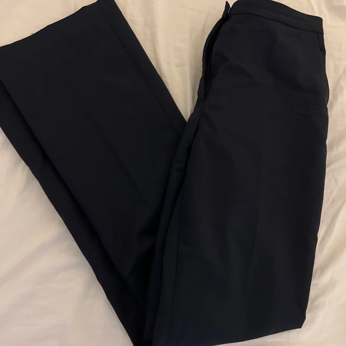 Mörkblåa kostymbyxor  - 90