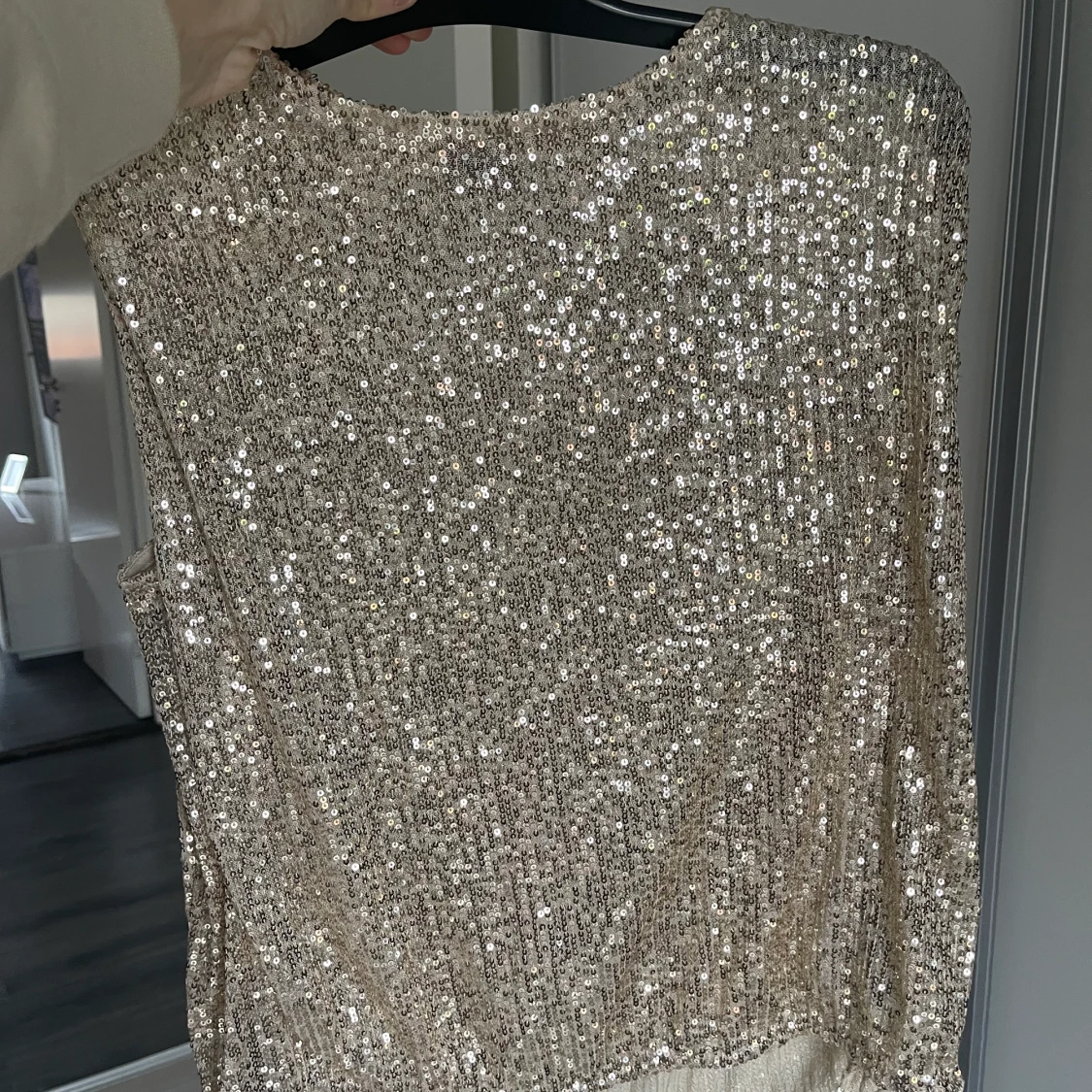 Glittrig top