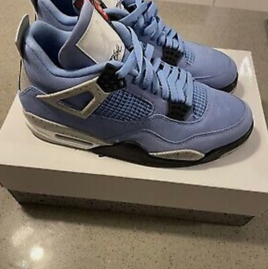 Jordan 4 unc