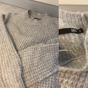 Stickad grå tröja  - Stickad grå tröja, helt ny