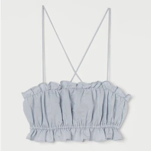 Ljusblå top i linnemix - Oanvänd strl M, passar S (strl kan justeras med band)