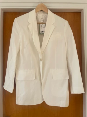 Kavaj, linneblandning - Kavaj, linneblandning.  Strl: xs Oanvänd  Frakt tillkommer - spårbart, 66 :- 