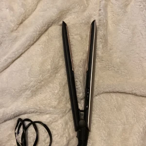 Remmington plattång - Säljer då jag köpt en ny, gammal plattång men funkar som den ska! 