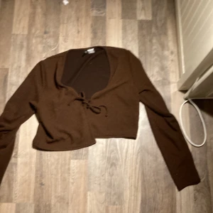 brun kofta - brun kofta från H&M storlek L