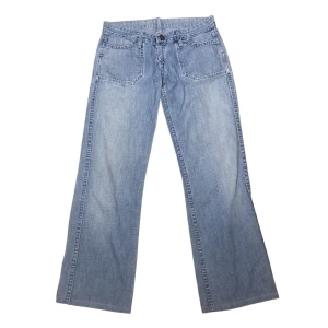 Lågmidjade jeans - Vida lågmidjade jeans från märket meltin’pot! Så fina, passar någon som är under 160