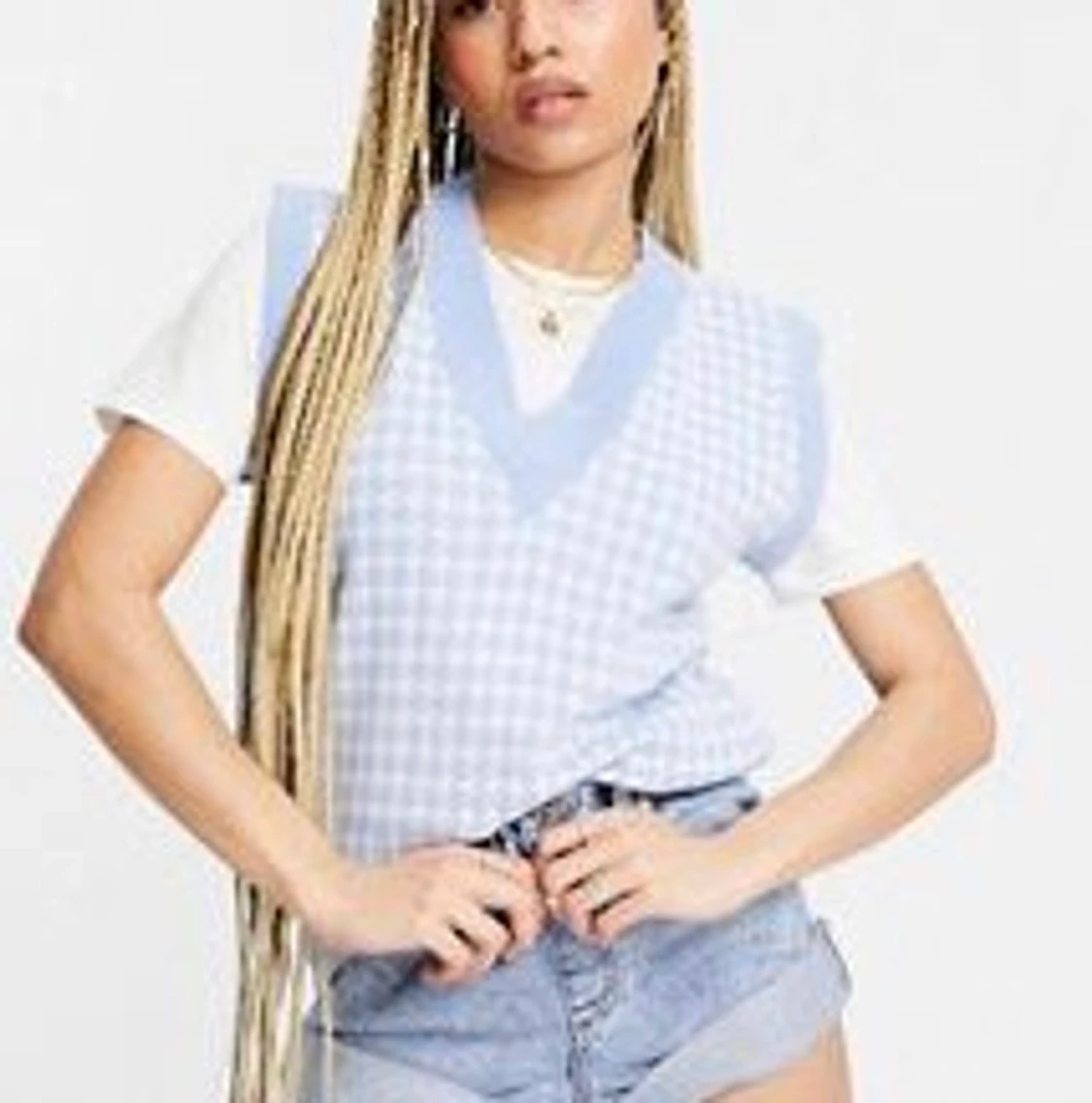 Blå stickad väst med hundtandsmönstrad  - 90