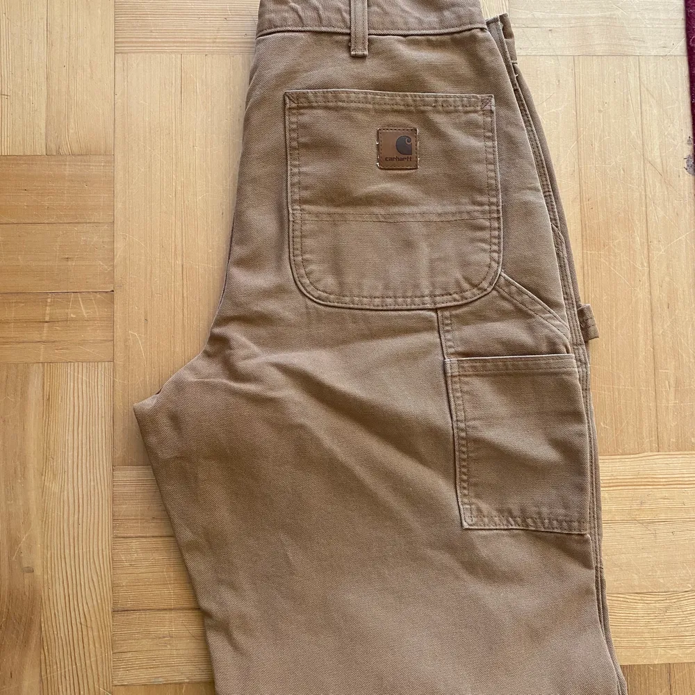 Carharrtt byxor storlek 32/234 Bra skick!  Vintage . Jeans & Byxor.