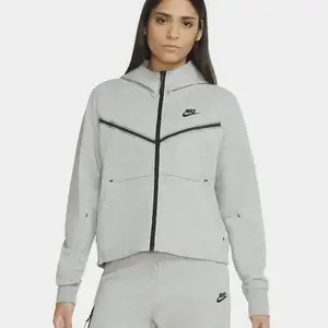 Söker en grå Nike tech fleece zip-up hoodie för ett bra pris. Helst strl xs/s eller m.