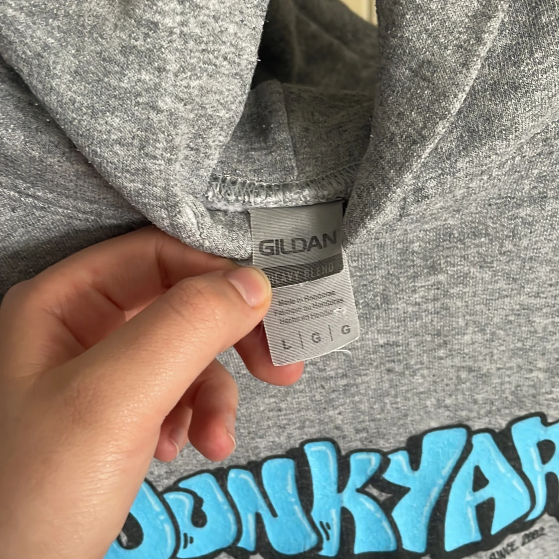 Grå huvtröja  - 91