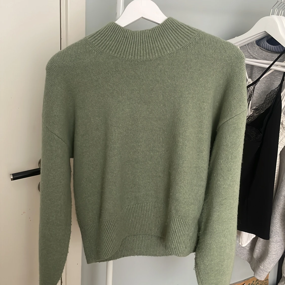 grön stickad tröja
