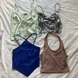 Tank tops - TRYCK EJ PÅ KÖP NU! ÄNNU FLER TRÖJOR, Garderobsrännsning! Gröna: Shein stl xs= 40 kr. Silver: divided xs= 20 kr. blå:gina stl xs = 40 kr. färgade: divided stl S = 20 kr
