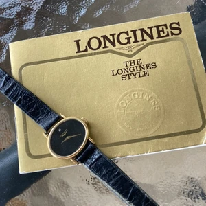 Vintage Longines klocka - Vintage klocka från Longines som är guld.  Pappret bakom klockan är äkta certifikat. Fullt fungerande , frakt ingår ej! (Pris diskuteras) 