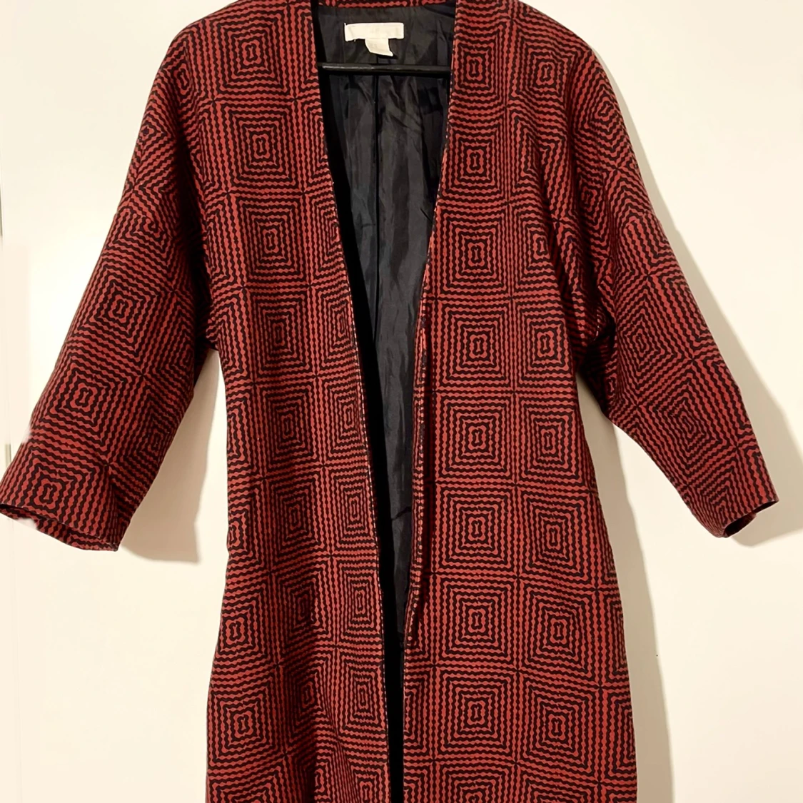 Mönstrad Kappa/innejacka med band