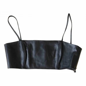 Skinn topp - zara - Äkta skinn topp från Zara i limited edition, finns inte att få tag på längre. Dragkedja på sidan.