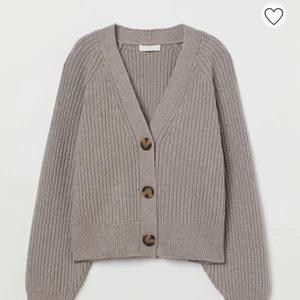 Kofta  - Grå kofta som inte används. Storlek S