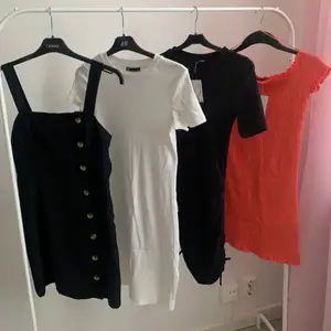 - Svart klänning med knappar från H&M, storlek 36 / - Vit T-shirtklänning från Zara, storlek S / -Svart T-shirtklänning med snöre på sidorna från H&M, storlek XS / -Orange klänning från Ginatricot, storlek S 
