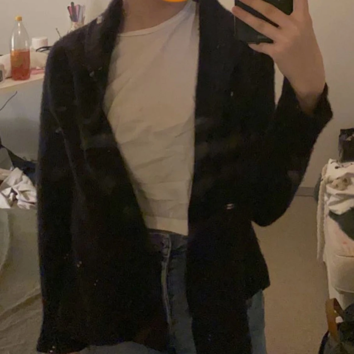Svart ullkofta