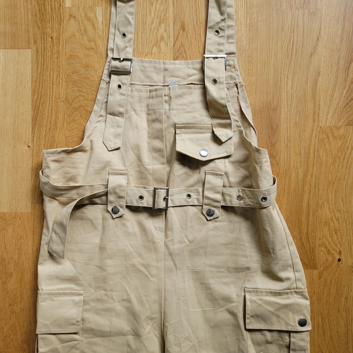 Oanvänd beige overall - 90