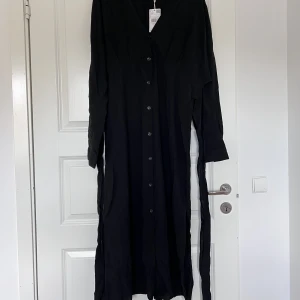 Vardagsklänning - New with tags