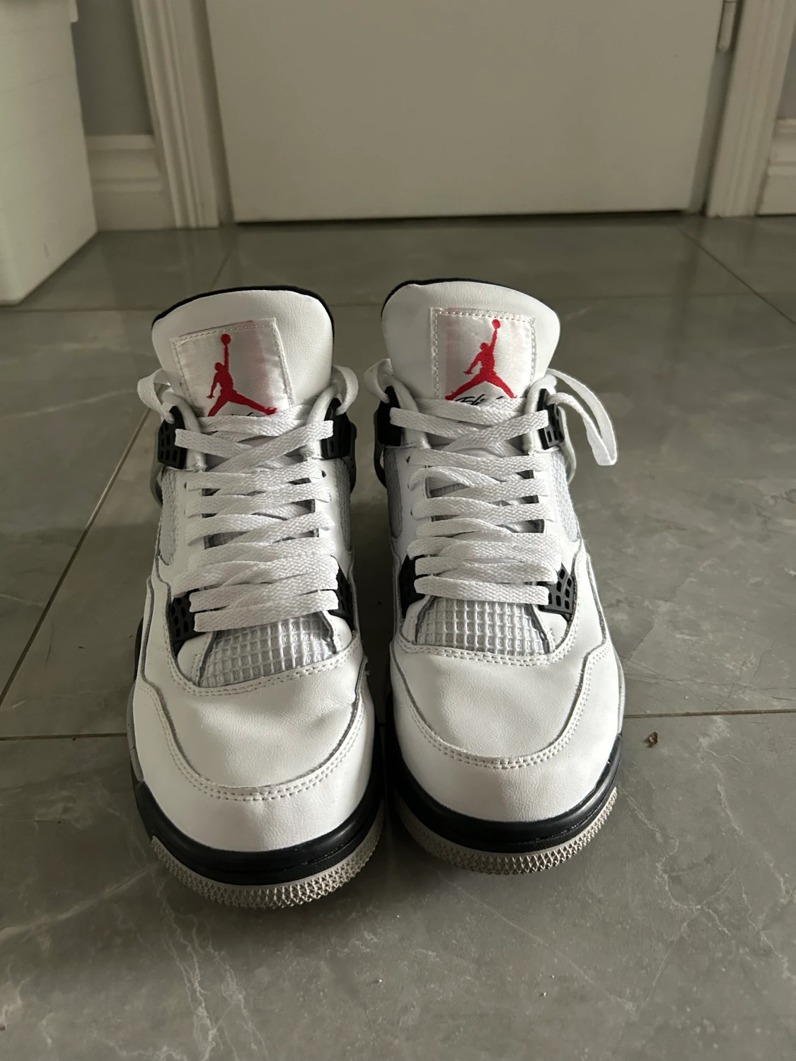 Jordan 4 white cement