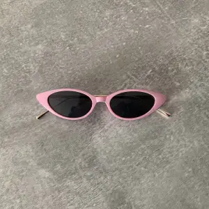 Rosa solglasögon