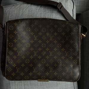 Authentic Louis Vuitton Abbesses Messenger model bag with the iconic monogram canvas.   Reference number: CA0034  Length 35 cm Width 9 cm Height 27  