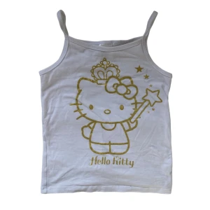 Hello Kitty tank - Super söt tank top med guldigt Hello Kitty tryck🕷️💋