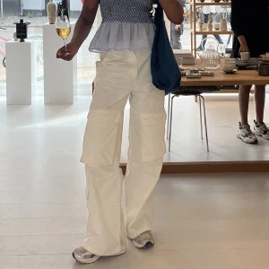 White cargo pants - slightly oversized cargo pants (i bought a size bigger than mine)  white, in good condition i’m 176 cm so does fit tall girls!