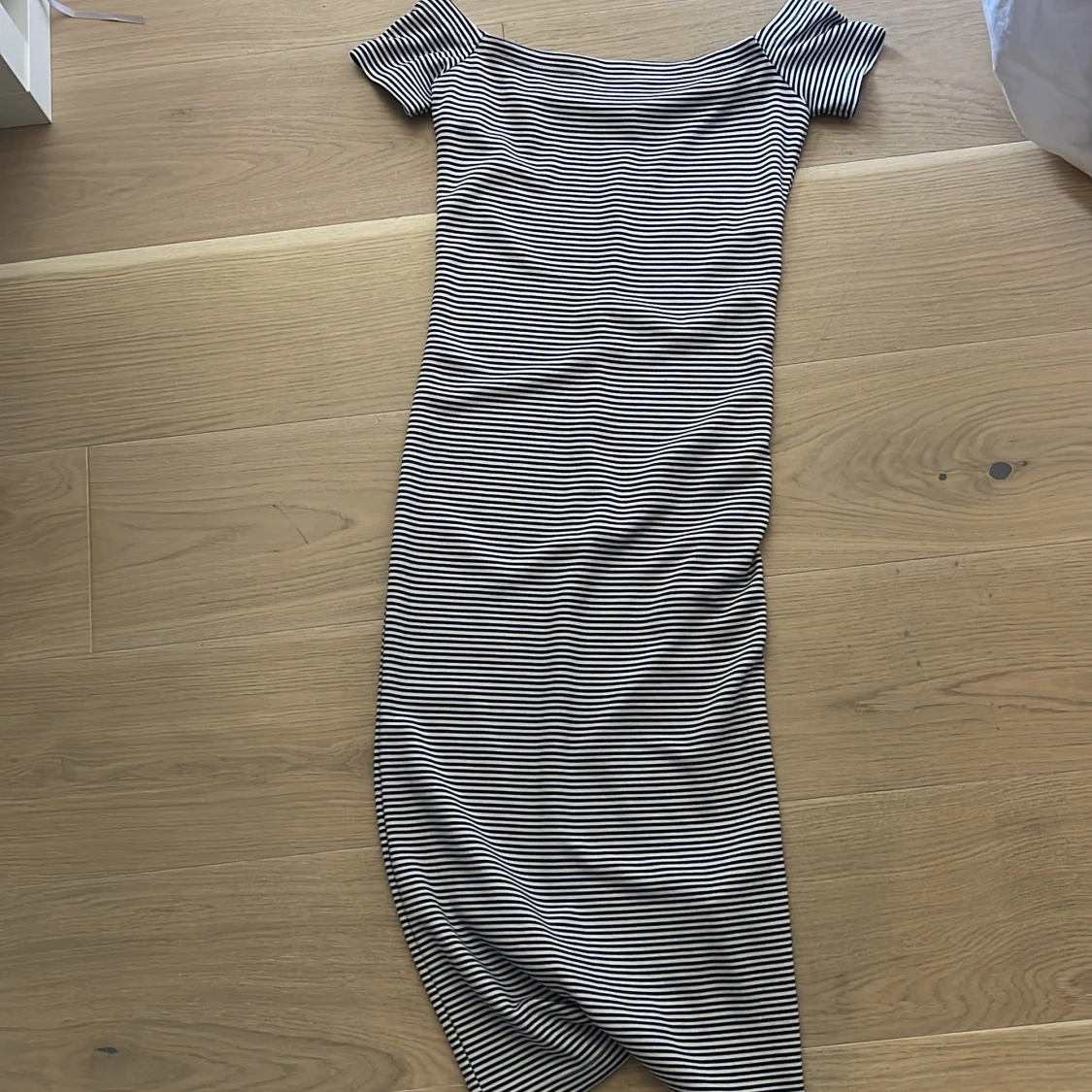 Lång tajt klänning