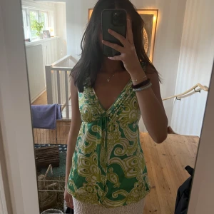 Cool topp - 💚💚köpt på secondhand, har aldrig använt!
